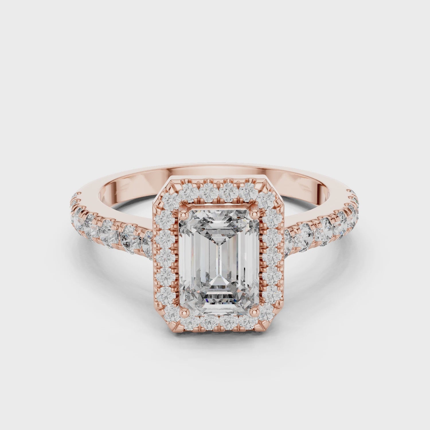 EMRALD ENGAGEMENT RING WITH HALO SETTING