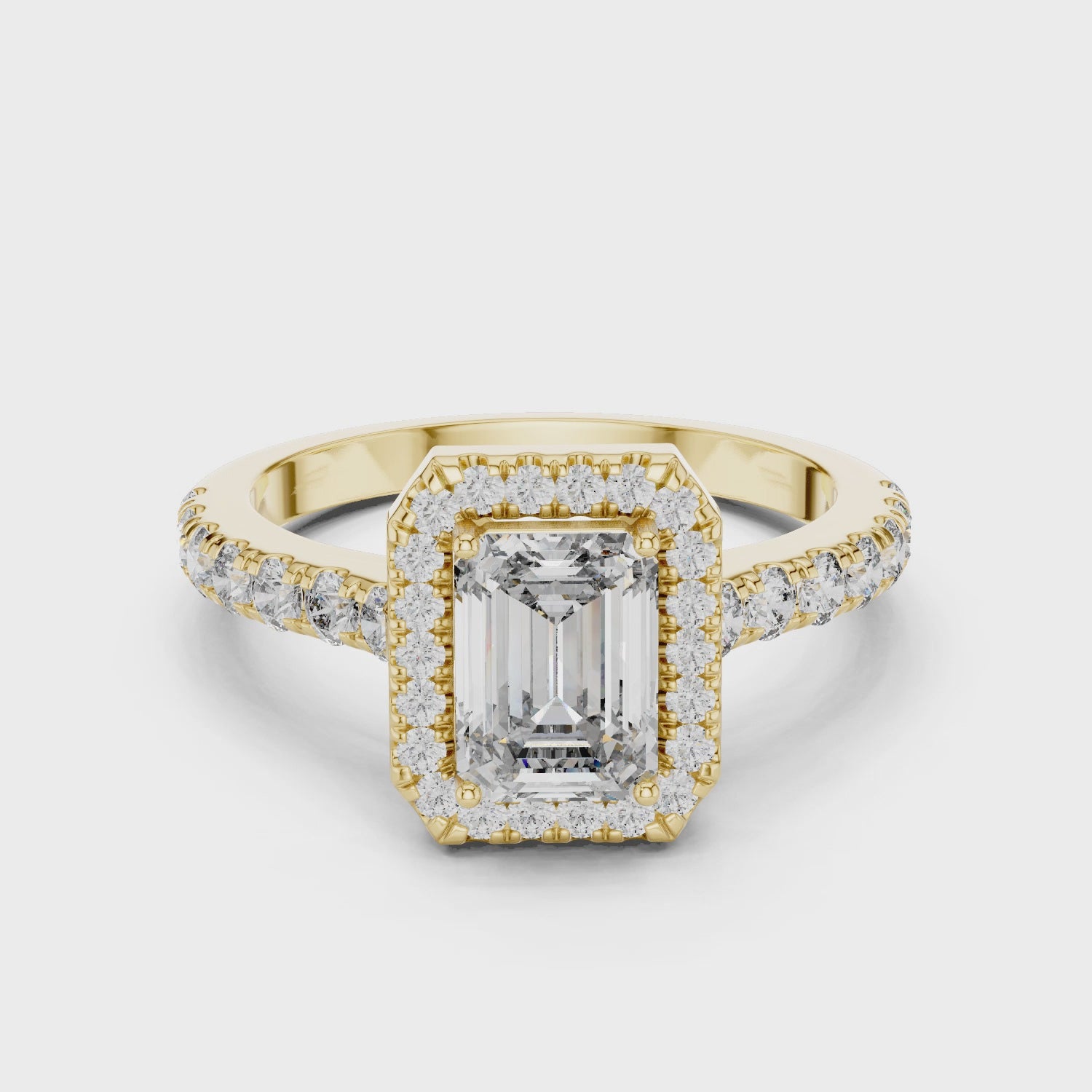 EMRALD ENGAGEMENT RING WITH HALO SETTING