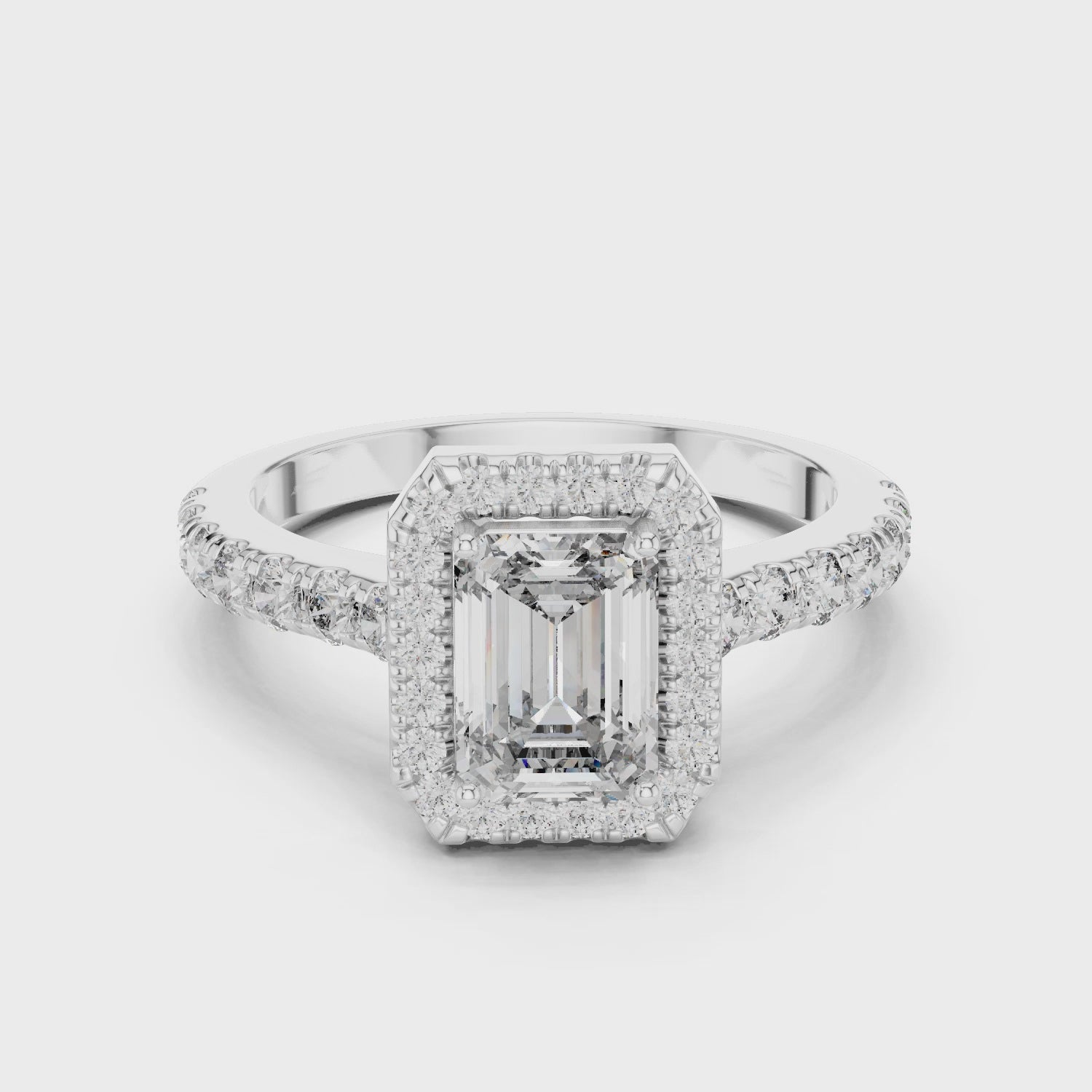 EMRALD ENGAGEMENT RING WITH HALO SETTING